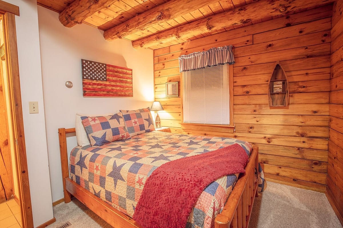 Warm log cabin bedroom